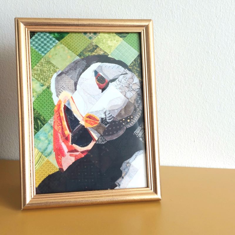 Puffin Poster in a frame. Quilt by Dröfn Teitsdóttir for kashima.is. Greetingcard and postcard